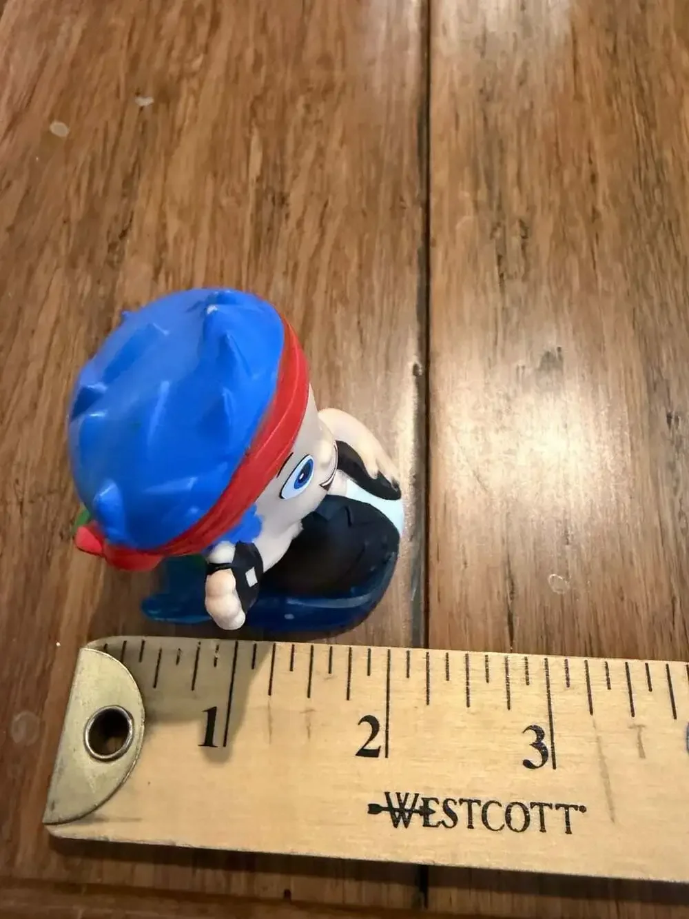 Fisher-Price Bubble Guppies Gil Rock and Roll Slider Figure